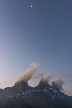 Aiguilles d'Arves mountain at dawn with the moon