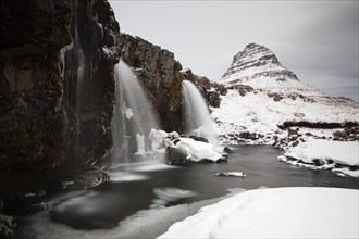 Kirkjufell mountain with waterfall