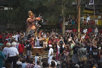 Ngrupuk parade with Ogoh-Ogoh figures on the night before the Nyepi or Balinese New Year celebration