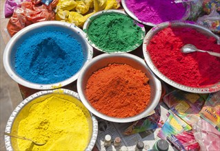 Colourful powder paints on sale for the Holi festival