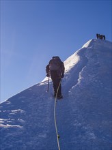 Alpinists climbing the Ludwigshohe peak