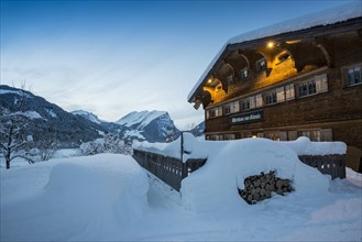 Deep snow-covered guest house Wirtshaus zum Gamsle