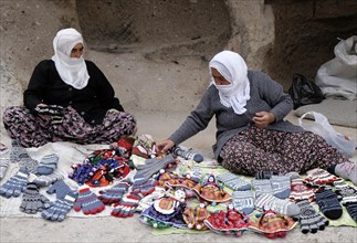 Women offering handicrafts