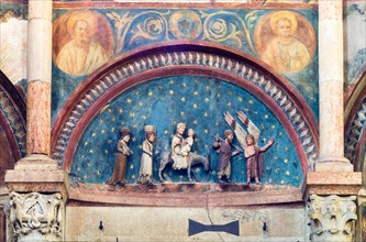 Romanesque stone relief above the portal