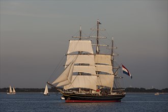 Evening sailing with the Stad Amsterdam in the foreground