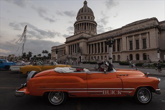 Vintage Buick from the 1950s in front of the Capitol at dusk