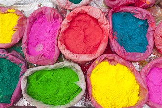 Colourful powder paints on sale for the Holi festival