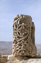 Stone with ornate relief