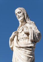 White Statue of Jesus Christ outside the Chapel of Virgen de la Pena