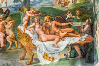 Amor and psyche on a bed
