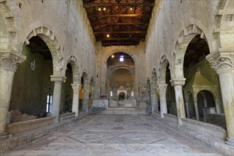 Columned basilica with an open roof and mosaic floor in Cosmatesque style