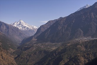 Sherpa village of Lukla in front of mountain panorama