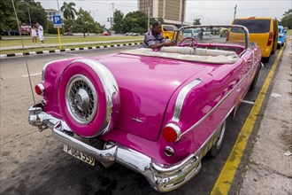 Pink convertible taxi