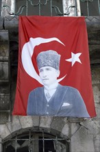 Turkish flag with the image of Mustafa Kemal Ataturk