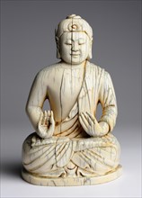 Old Buddha sculpture made of ivory