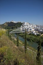 View over the Rio Guadalete on the old town of Arcos de la Frontera