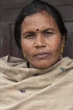 Nepalese woman with earrings