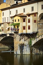 The medieval Ponte Vecchio bridge crossing the River Arno in the historic centre of Florence