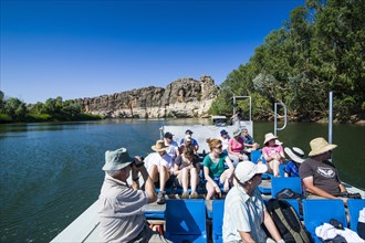 Tourists on a tourist boat in the Geikie Gorge