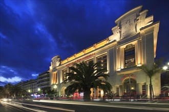 Hotel and Casino Palais de la Mediterranee on the Promenade des Anglais in the evening
