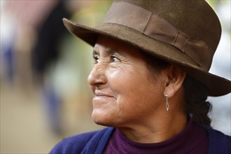 Old woman wearing a traditional hat