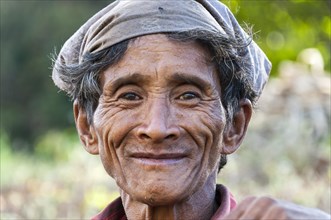 Elderly smiling man from the Lahu people