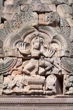 Pediment adorning the doorway to the main tower depicting Shiva Nataraja or Hindu god in dancing posture