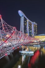 Marina Bay Sands Hotel and the Double Helix Bridge at night