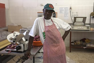Young Namibian butcher wearing baseball cap