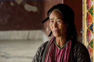 Pilgrim front of a Gelugpa monastery