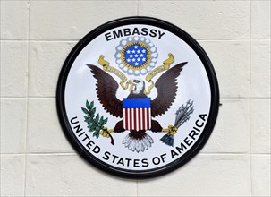 Logo of the American Embassy