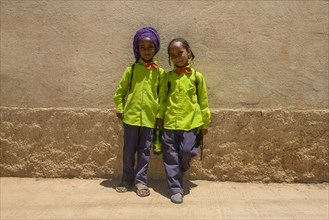 School girls wearing school uniforms