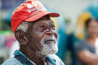 Old Brazilian man wearing a CUT cap