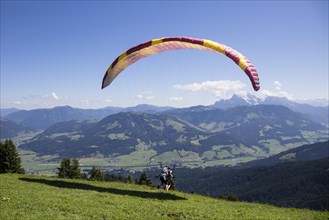 Paragliders in tandem during take-off