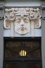 House entrance with Art Nouveau stucco mask