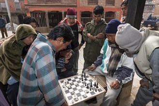 Nepalese men playing chess