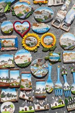 Miniature ceramic fridge magnets with motifs of Ostuni and Alberobello