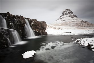 Kirkjufell mountain with waterfall