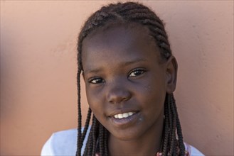 Namibian girl with braided hair