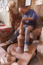 Potter Hasan Bircan in his pottery Chez Bircan