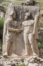 Dexiosis-relief of Mithridates or Antiochos and Herakles
