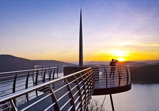 Viewing platform Biggeblick with a person at sunset