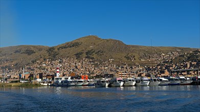 Boats in the harbour of Puno on Lake Titicaca