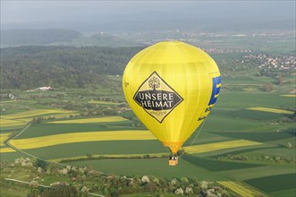 Hot air balloon with lettering: ""Unsere Heimat""