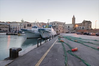 Fishing nets laid out to dry in the harbor