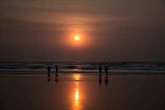 Fishermen at sunrise