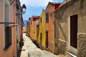 Colourful houses in a narrow alleyway of the historic centre