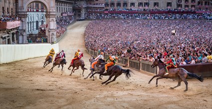 The Palio di Siena horse race on Piazza del Campo