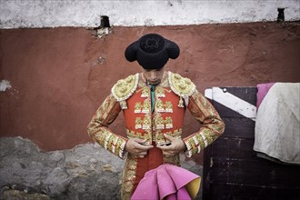 Matador before a bullfight in the arena