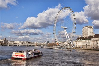City Cruises riverboat approaching the London Eye